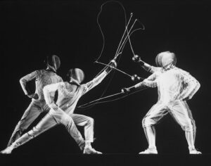 Stroboscopic%2Bimage%2Bof%2BNew%2BYork%2BUniversity%2Bfencing%2Bchampion%2BArthur%2BTauber%2B%2528left%2529%2Bparrying%2Bwith%2BSol%2BGorlin%252C%2B1942.jpg