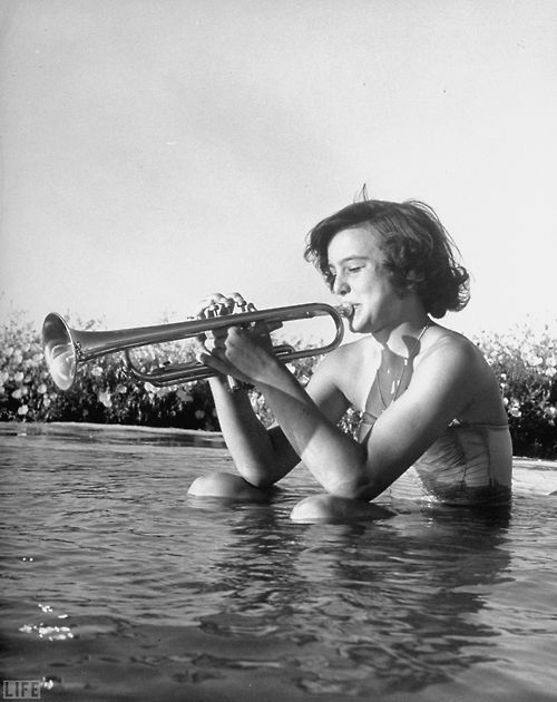 Sandy2BGoforth2Bseated2Bin2Ba2Bpool2Bblowing2Bon2Ba2Btrumpet252C2B1951