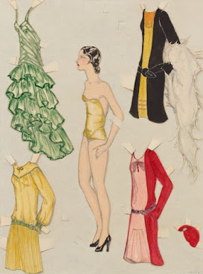Paper doll model with outfits circa 1930s. Photograph by Josh White.
