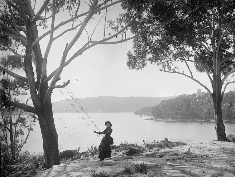 Girl on swing at Folly Point ca. 1886