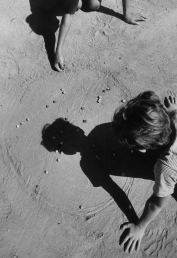 Patrick Powell Playing marbles 1970