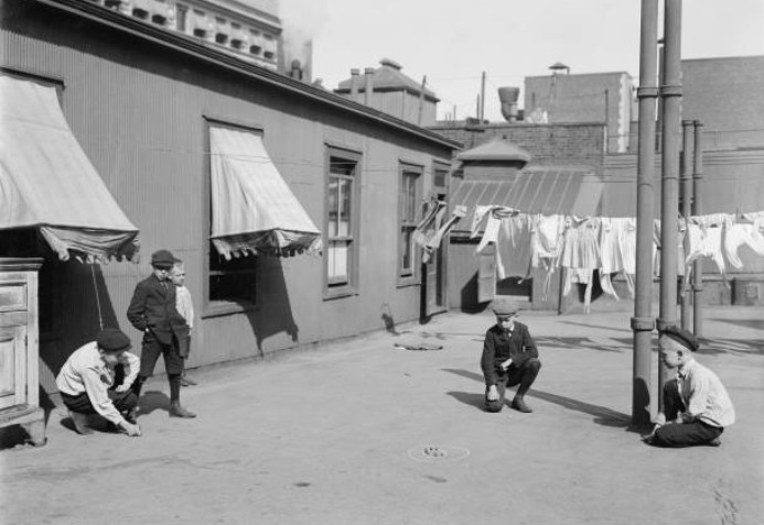 Playing Marbles on Apartment Building Rooftop New York 1910
