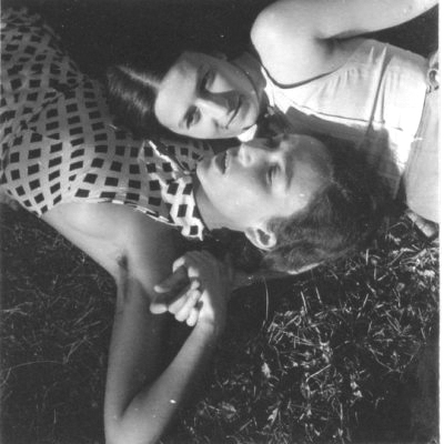 Eva Besnyo Panni Kirchner and Magda Besnyo lying in the grass