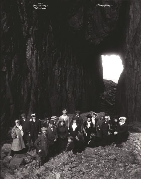 Anders Beer Wilse A group of people in the hole at Torghatten Norway 1907