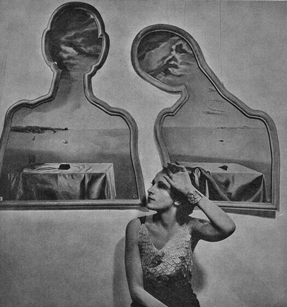 Frame inside | Heads Full of Clouds | Salvador Dali / Gala Dalí, 1936 2 Frame inside | Heads Full of Clouds | Salvador Dali / Gala Dalí, 1936 Gala Dali in front of two cut out paintings collectively known as Couple with Their Heads Full of Clouds by Cecil Beaton London 1936