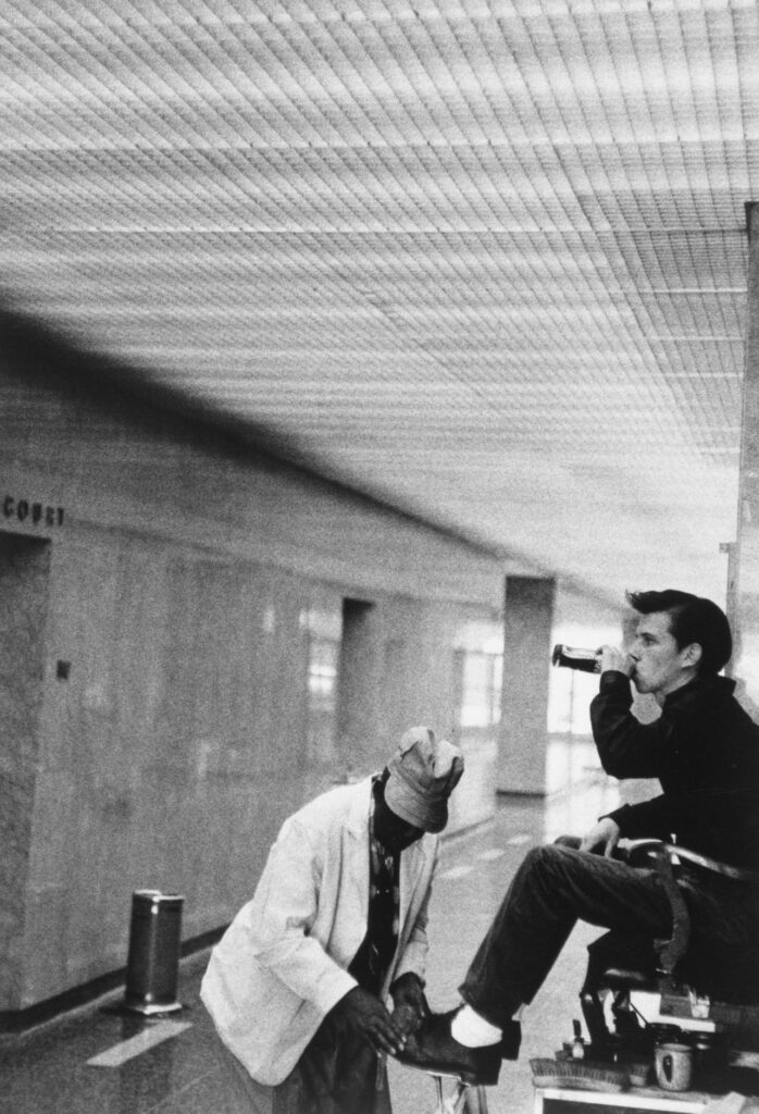 Larry Clark. Billy having a beer at the courthouse while getting his shoes shined. Tulsa 1962 1973